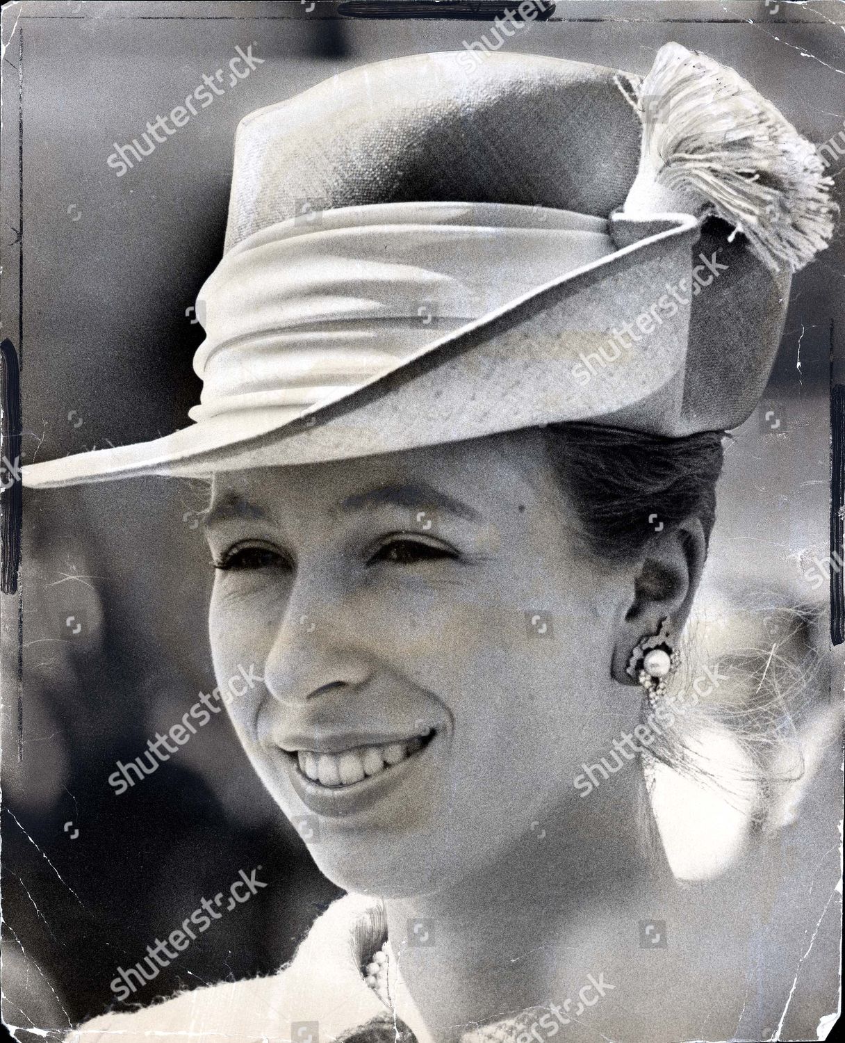 princess-anne-now-princess-royal-1970-picture-shows-h-r-h-princess-anne-arriving-back-at-london-airport-4th-may-after-a-9-week-royal-tour-of-australasia-h-r-h-princess-anne-in-a-check-mini-coat-and-australian-style-bush-hat-shutterstock-editorial-890855a.jpg