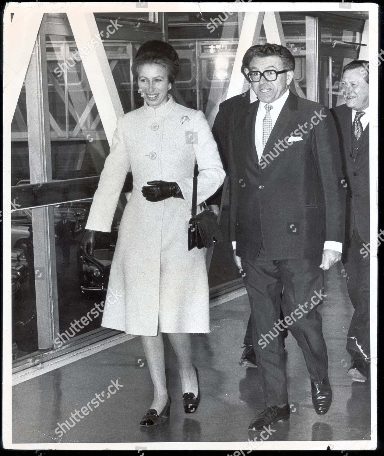 princess-anne-now-princess-royal-april-1975-princess-anne-with-mr-percy-whitford-deputy-chairman-of-the-b-a-a-princess-anne-at-the-airport-this-evening-before-leaving-for-australia-is-greeted-by-mr-percy-whitford-deputy-director-of-the-british-a-shutterstock-editorial-891740a.jpg