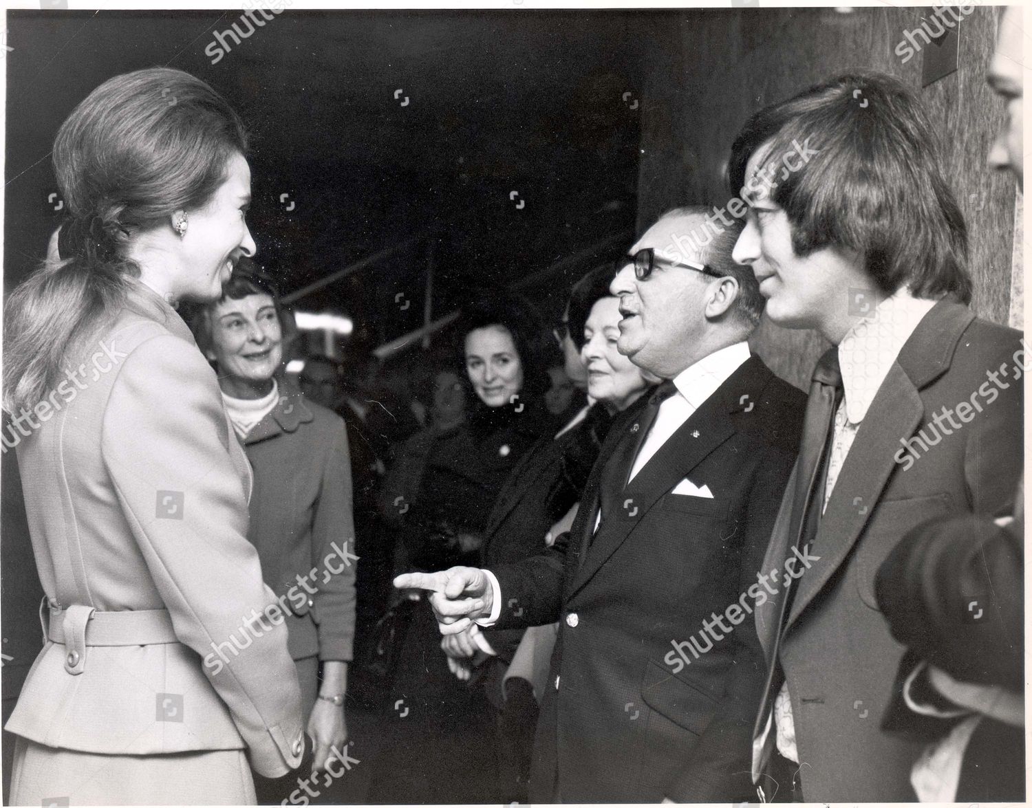 princess-anne-now-princess-royal-1971-picture-shows-princess-anne-shares-a-joke-with-comedian-charlie-chester-and-disc-jockey-tony-blackburn-when-she-met-him-at-an-art-exhibition-in-aid-of-save-the-children-fund-at-new-zealand-house-today-charli-shutterstock-editorial-892389a.jpg