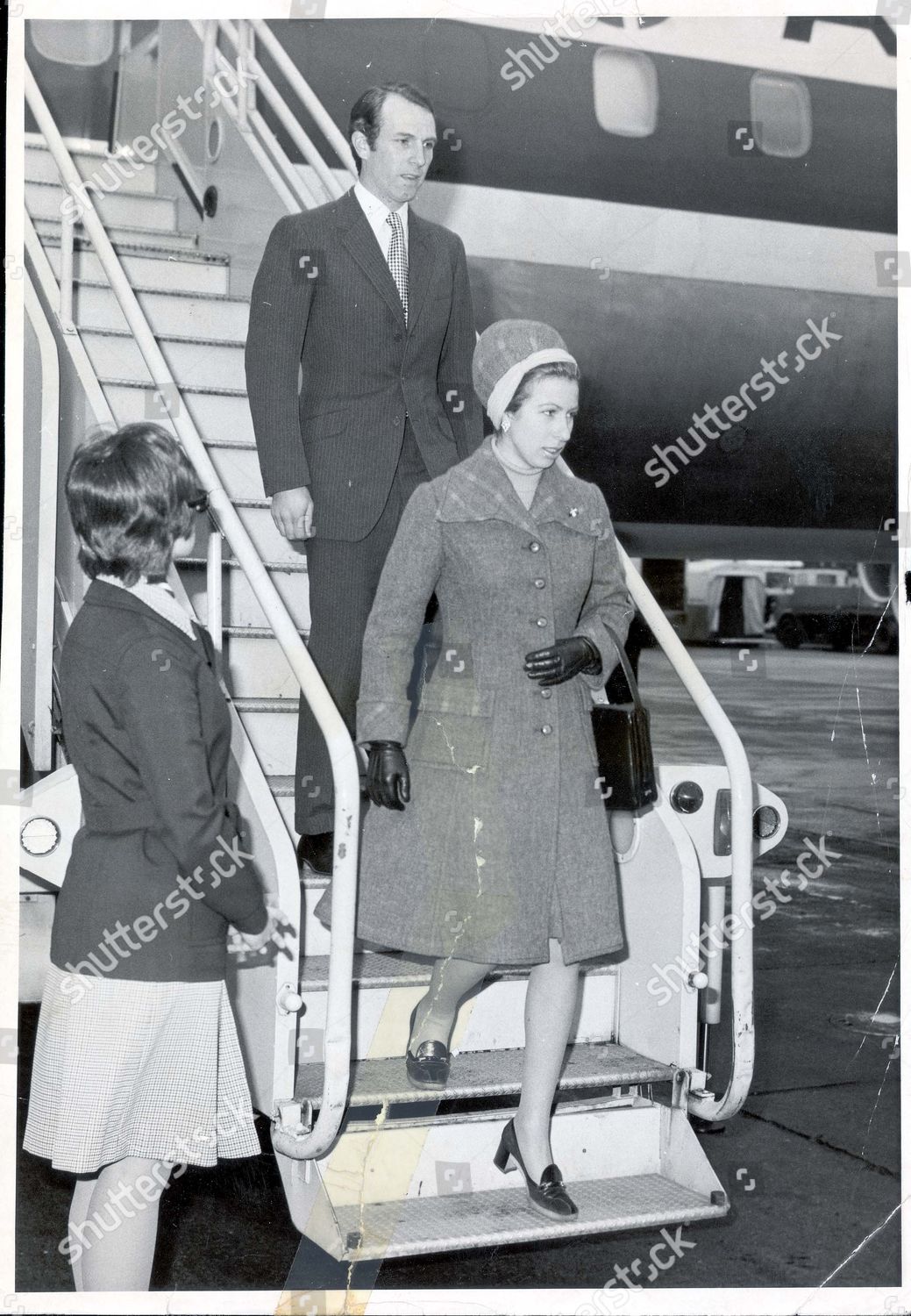 princess-anne-now-princess-royal-and-captain-mark-phillips-november-1974-princess-anne-and-her-husband-captain-mark-phillips-on-their-arrival-at-londons-heathrow-airport-this-morning-from-canada-during-their-short-visit-the-royal-couple-opened-the-shutterstock-editorial-895496a.jpg