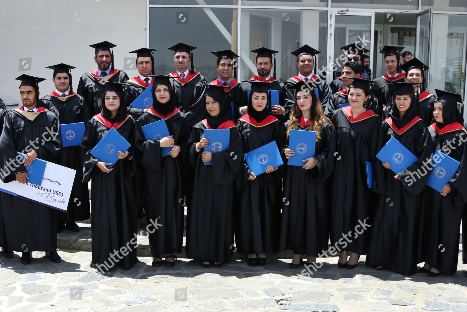 Students Pose Photographer After Graduating American University