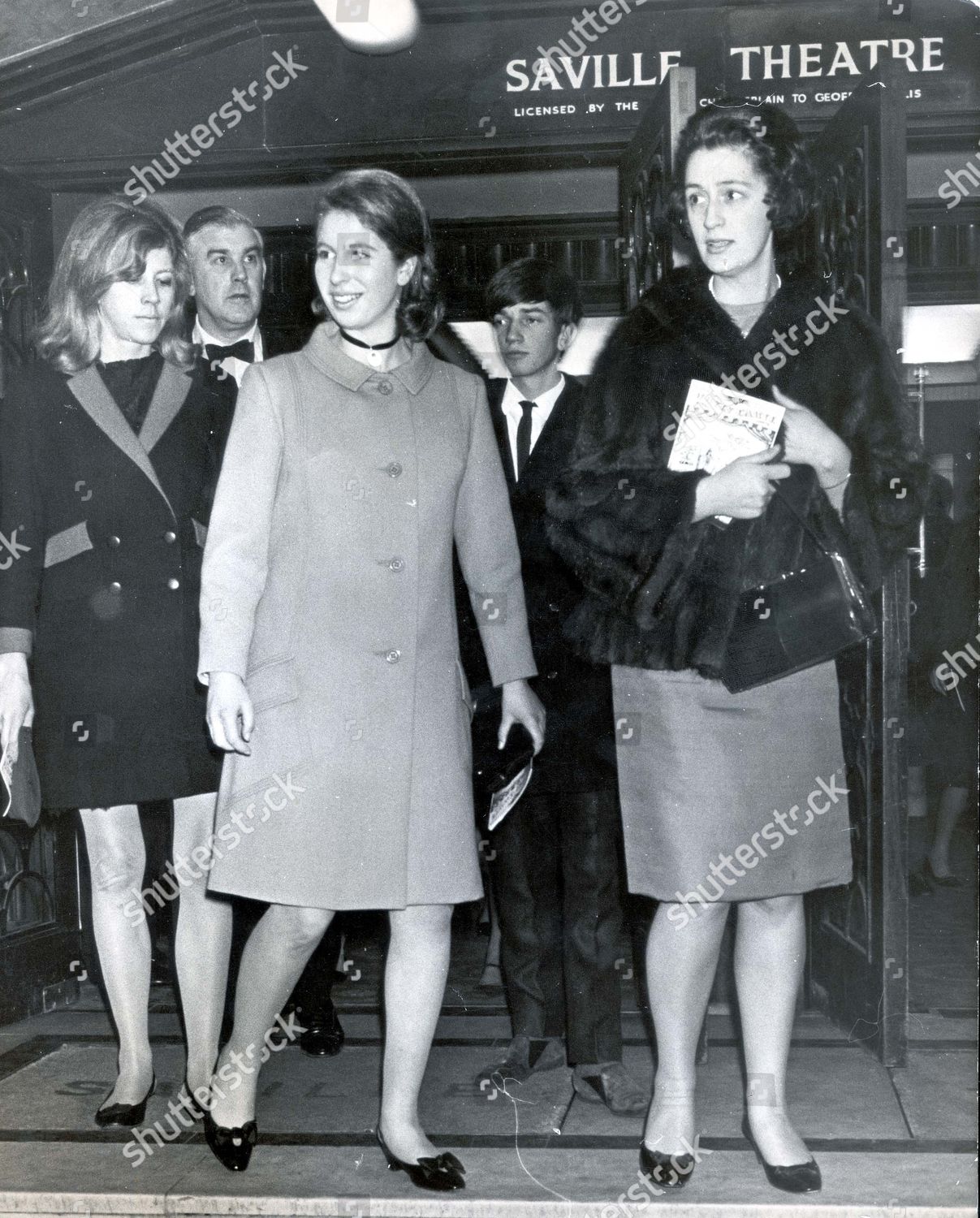 princess-anne-now-princess-royal-december-1967-princess-anne-leaves-saville-theatre-tonight-with-marmaduke-hussey-left-rear-royalty-shutterstock-editorial-896277a.jpg
