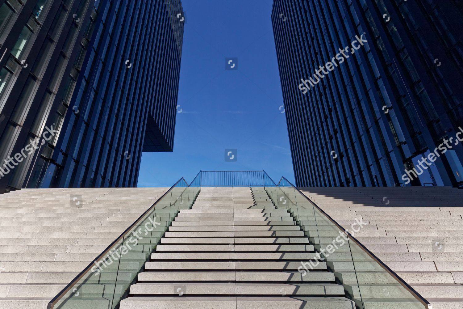 wide-staircase-leading-upwards-between-skyscrapers-editorial-stock