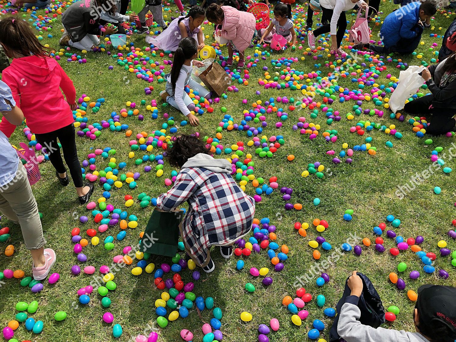 Children collect Easter eggs during Connection Point Editorial Children collect Easter eggs during Connection Point Editorial