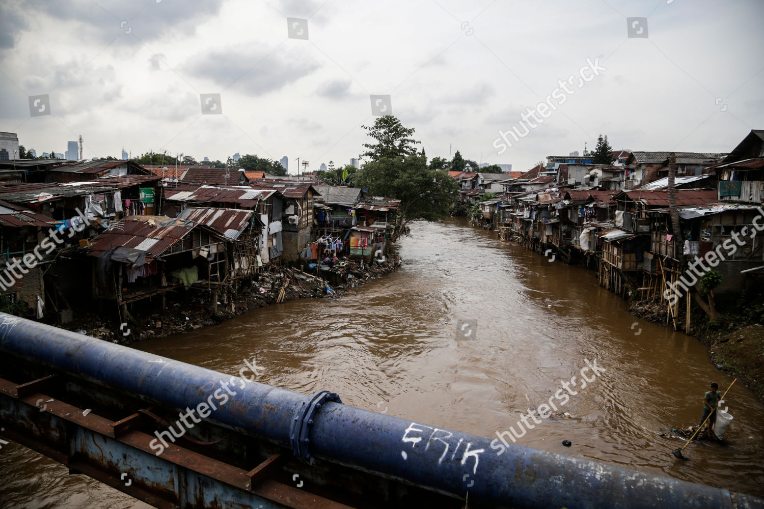 slum residential area by Ciliwung river  Jakarta  Editorial 