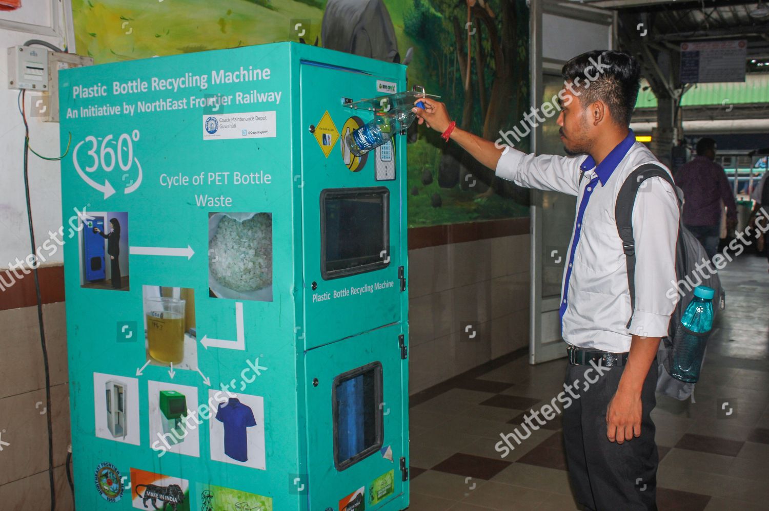 passenger-using-plastic-bottle-recycling-machine-editorial-stock-photo