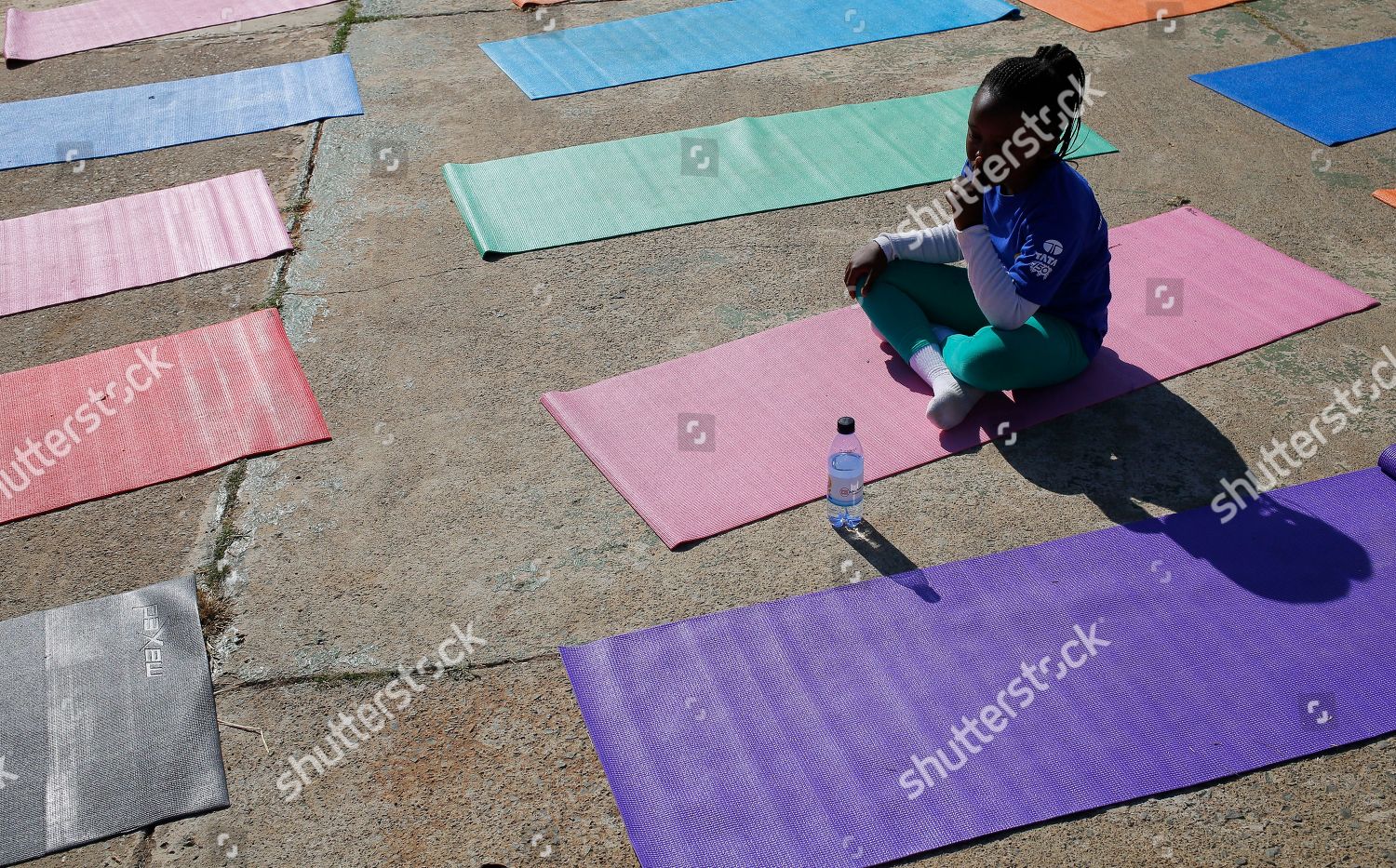 Young School Girls Practices Meditation During Yoga Editorial