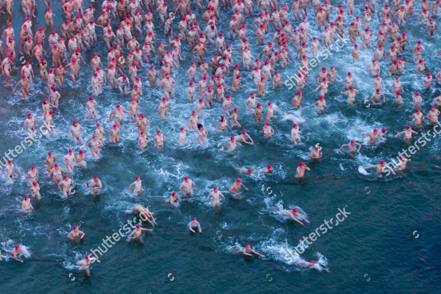 Dark Mofo skinny dip sees almost 700 nude swimmers brave 