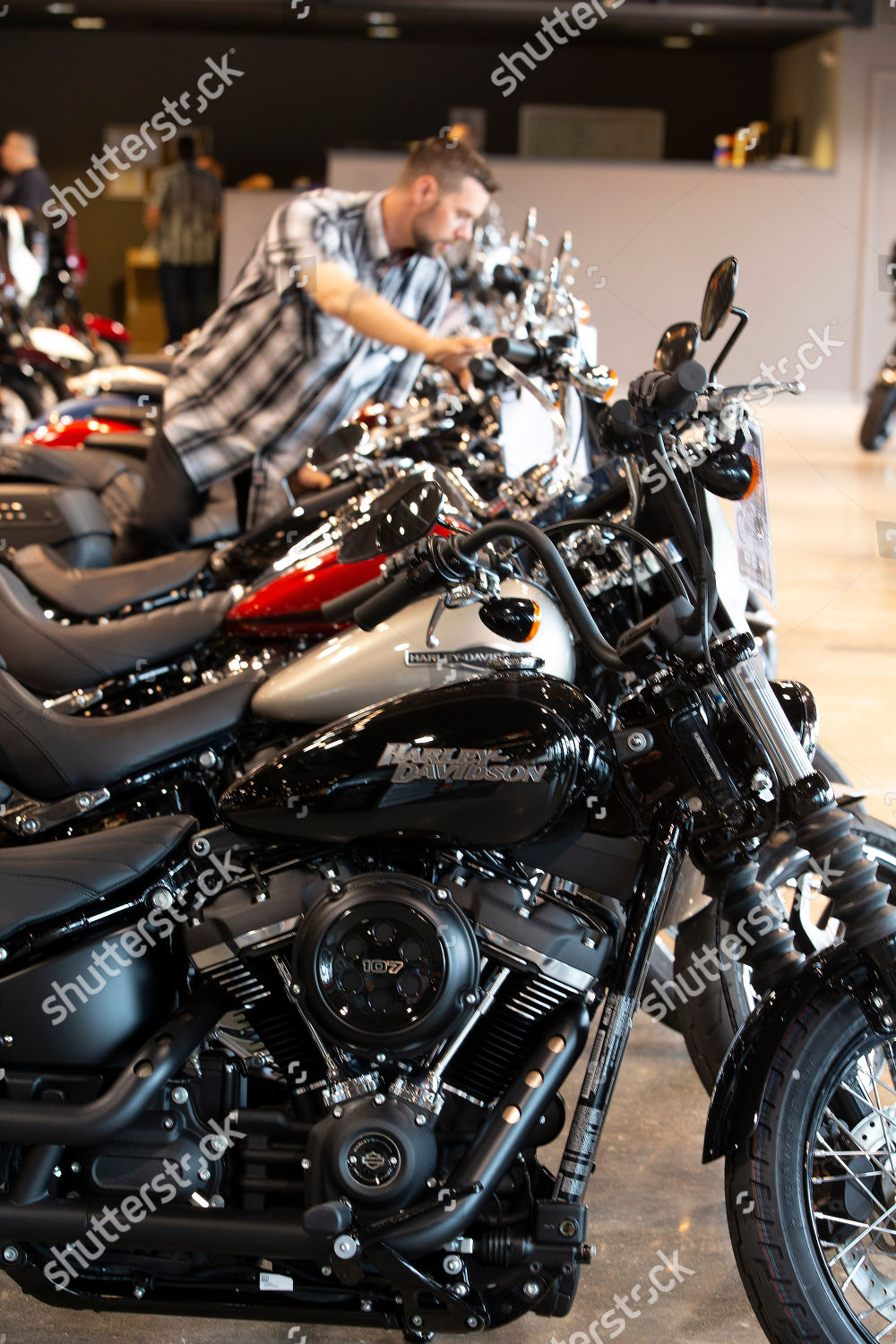 Boston Harley Davidson >> Employee Tends Harley Davidson Motorcycles Boston Harley Boston Harley Davidson >> Employee Tends Harley Davidson Motorcycles Boston Harley