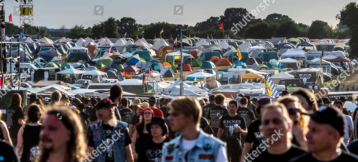  Foto zu Visitors Walk Camping Ground Wacken Open Editorial Stock Photo - Stock 