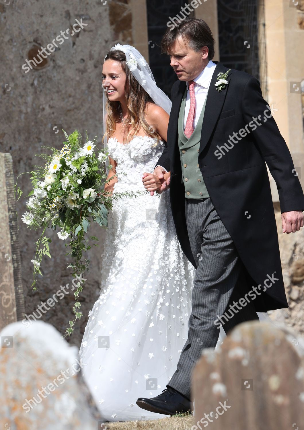 the-wedding-of-daisy-jenks-and-charlie-van-straubenzee-st-mary-the-virgin-church-frensham-surrey-uk-shutterstock-editorial-9779678ad.jpg