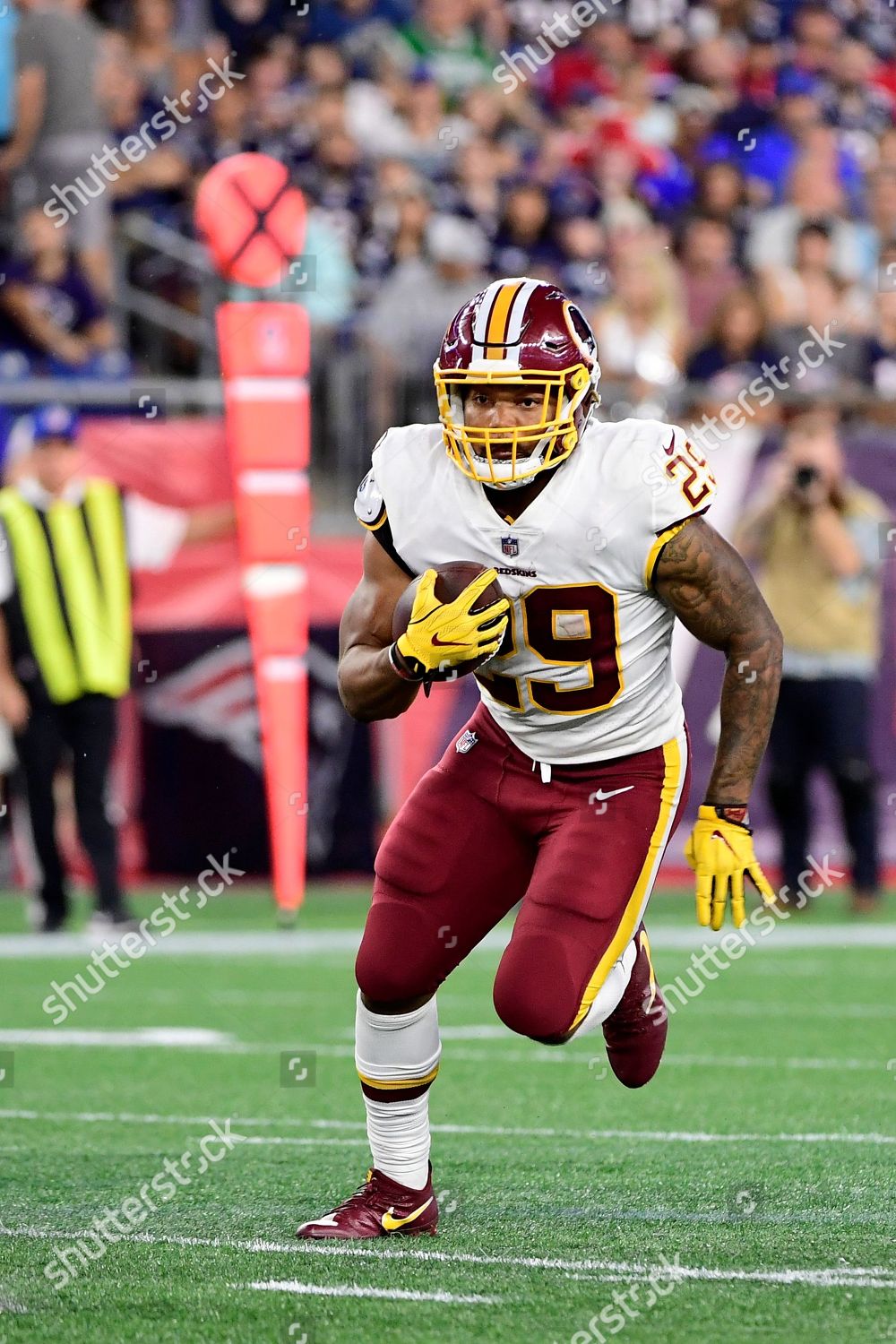 Washington Redskins' Derrius Guice runs during the first half of