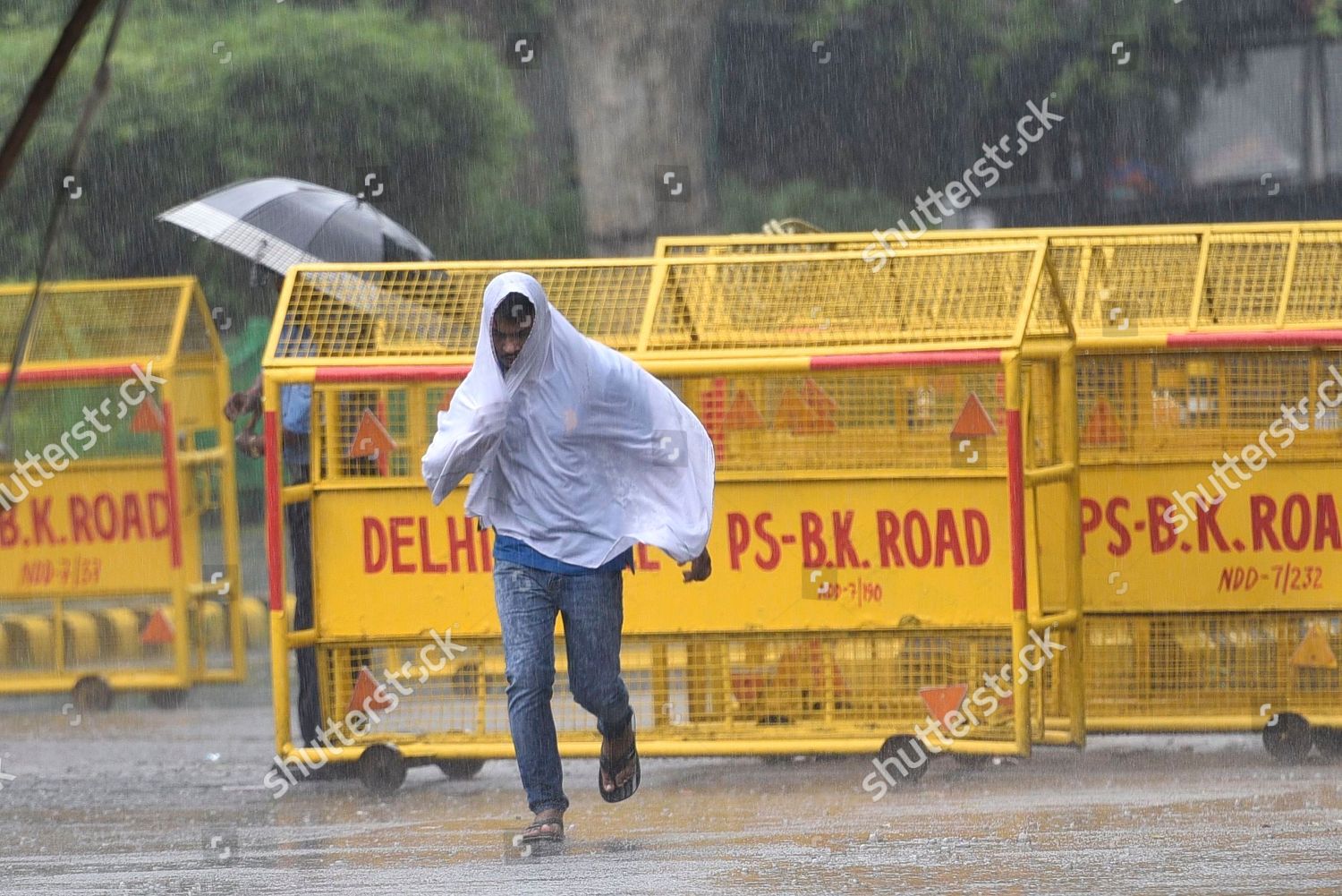 Pedestrian Uses Plastic Sheet Shelter Rain Editorial Stock Photo