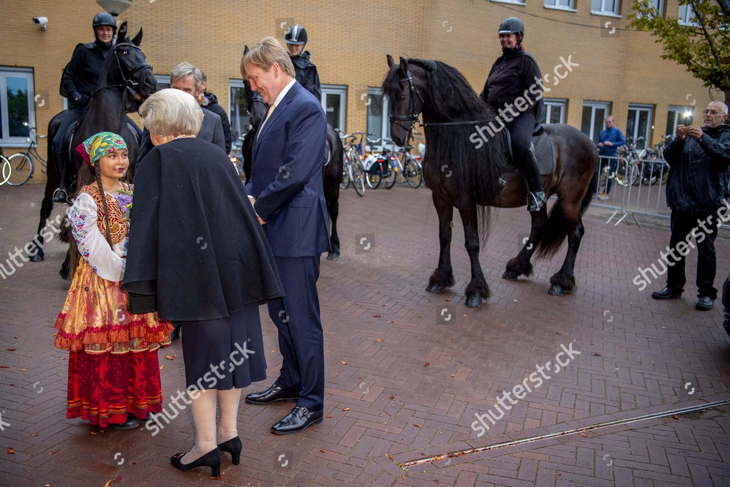 princess-beatrix-and-king-willem-alexander-at-the-premiere-of-theater-production-de-stormruiter-leeuwarde-the-netherlands-shutterstock-editorial-9877562as.jpg