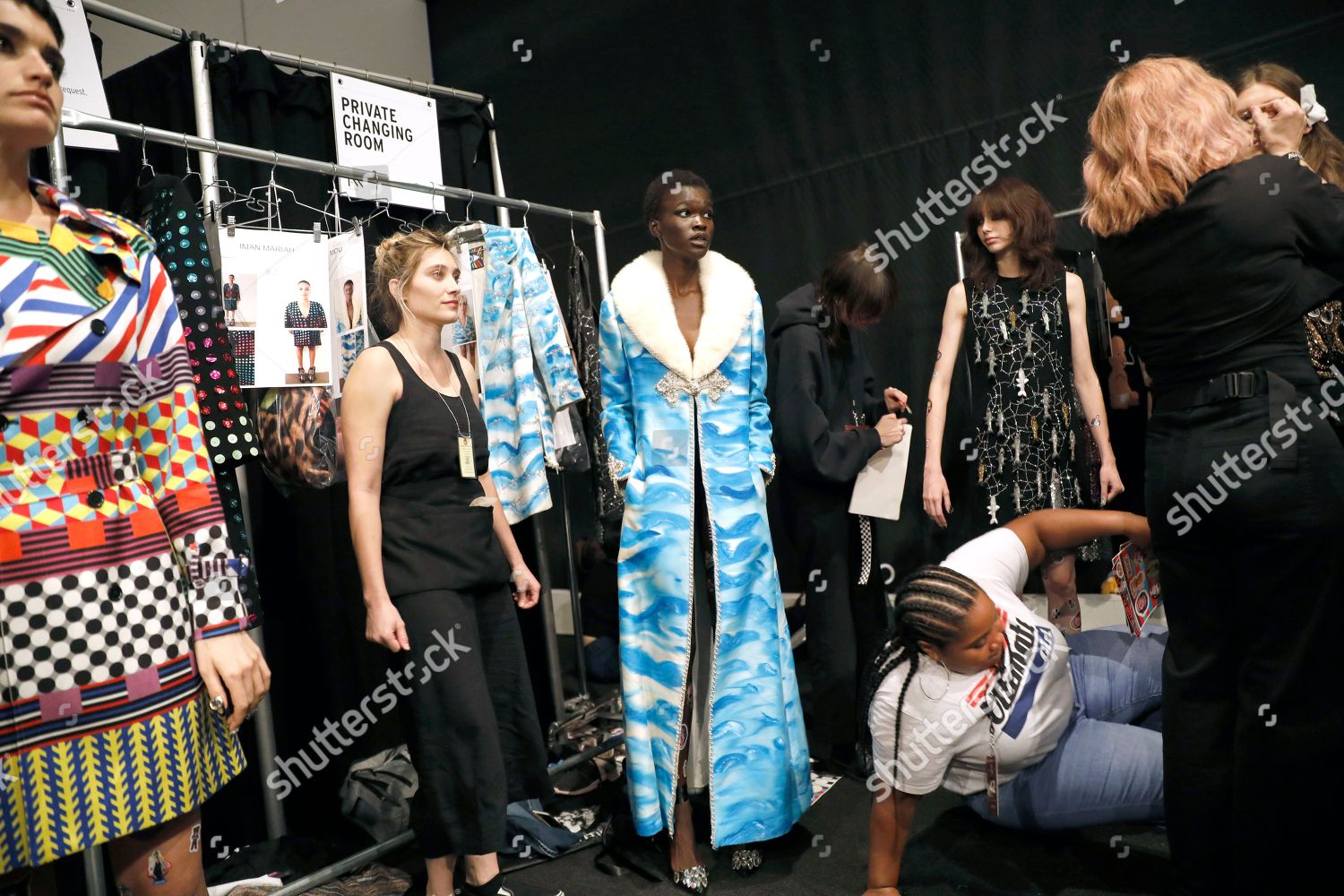 Fashion Models Changing Backstage