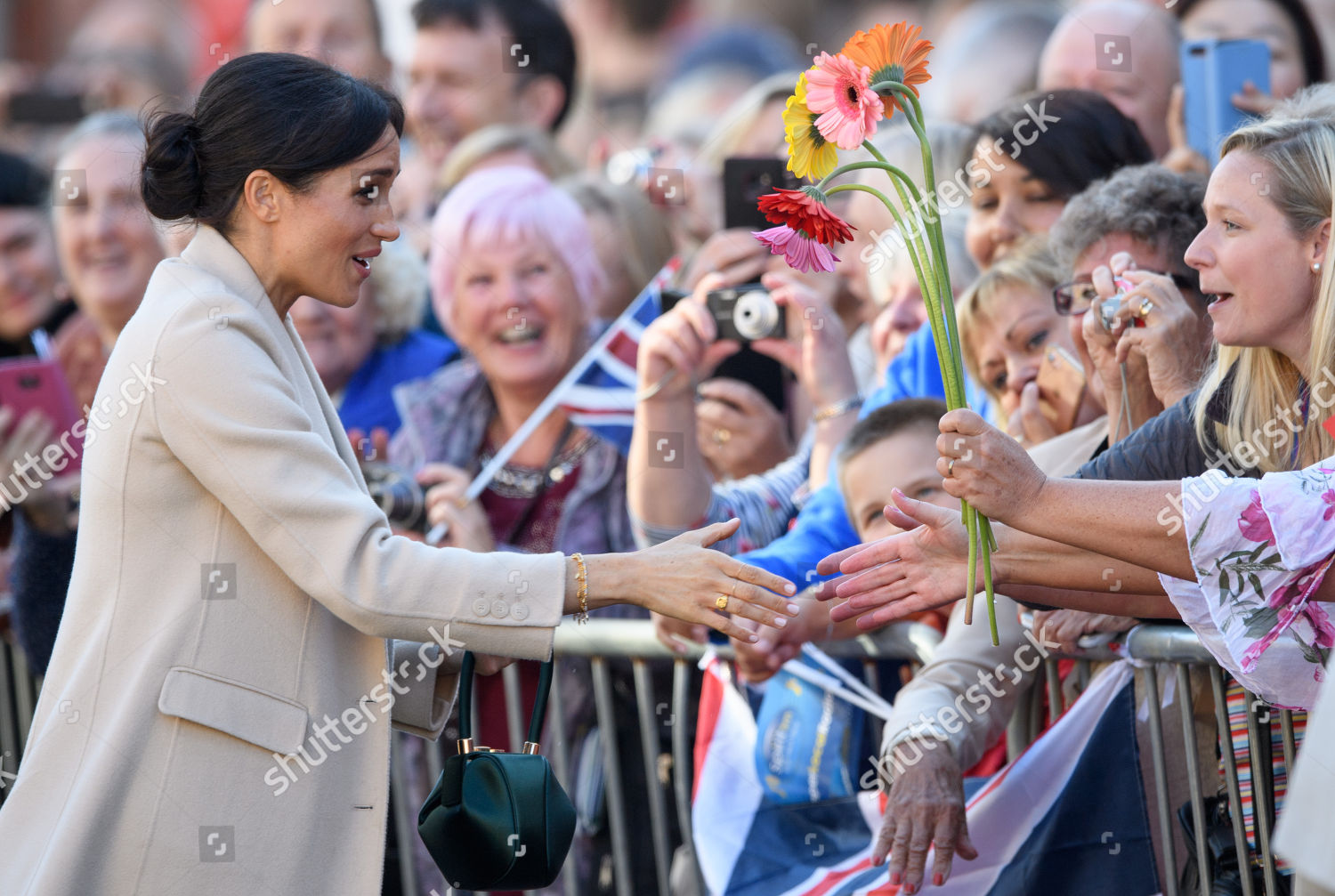 prince-harry-and-meghan-duchess-of-sussex-visit-to-sussex-uk-shutterstock-editorial-9912816by.jpg