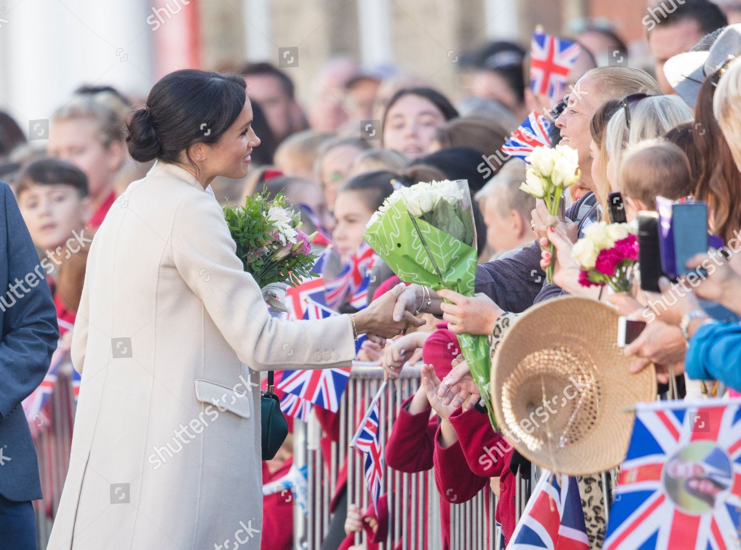prince-harry-and-meghan-duchess-of-sussex-visit-to-sussex-uk-shutterstock-editorial-9912893h.jpg