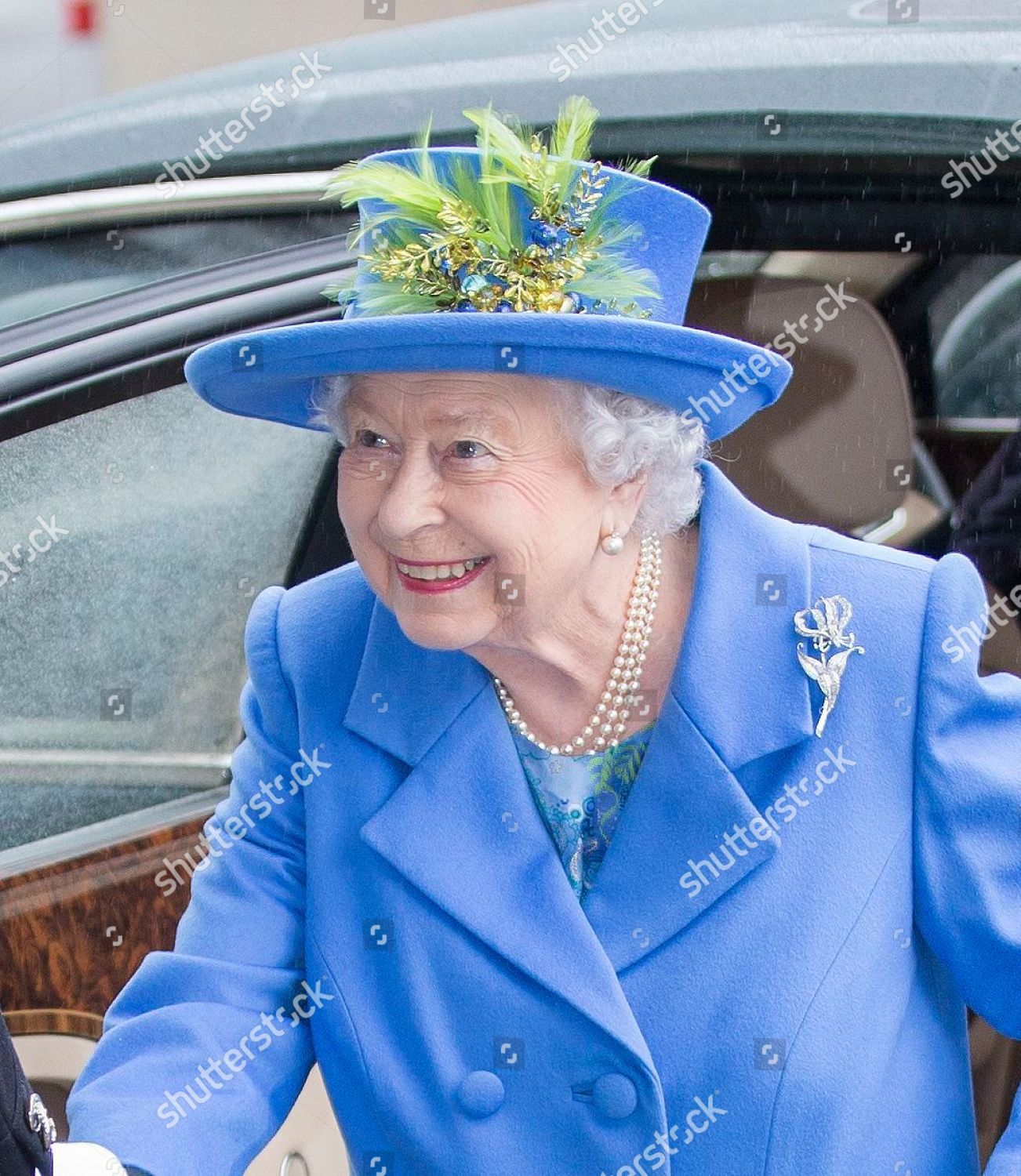 queen-elizabeth-ii-visits-the-royal-air-force-club-london-uk-shutterstock-editorial-9935966c.jpg