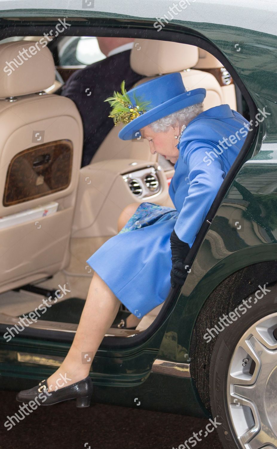 queen-elizabeth-ii-visits-the-royal-air-force-club-london-uk-shutterstock-editorial-9935966d.jpg