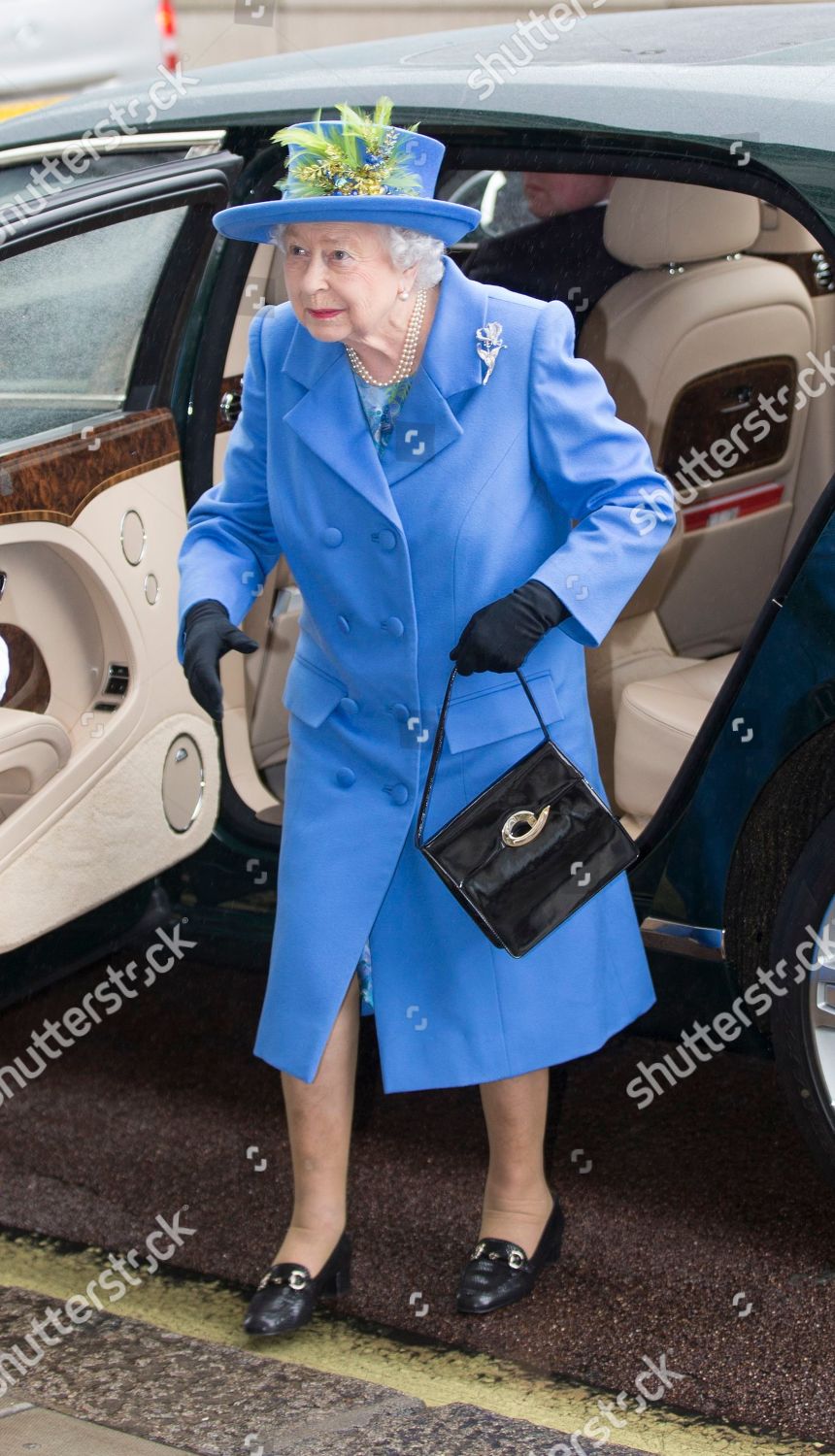 queen-elizabeth-ii-visits-the-royal-air-force-club-london-uk-shutterstock-editorial-9935966f.jpg