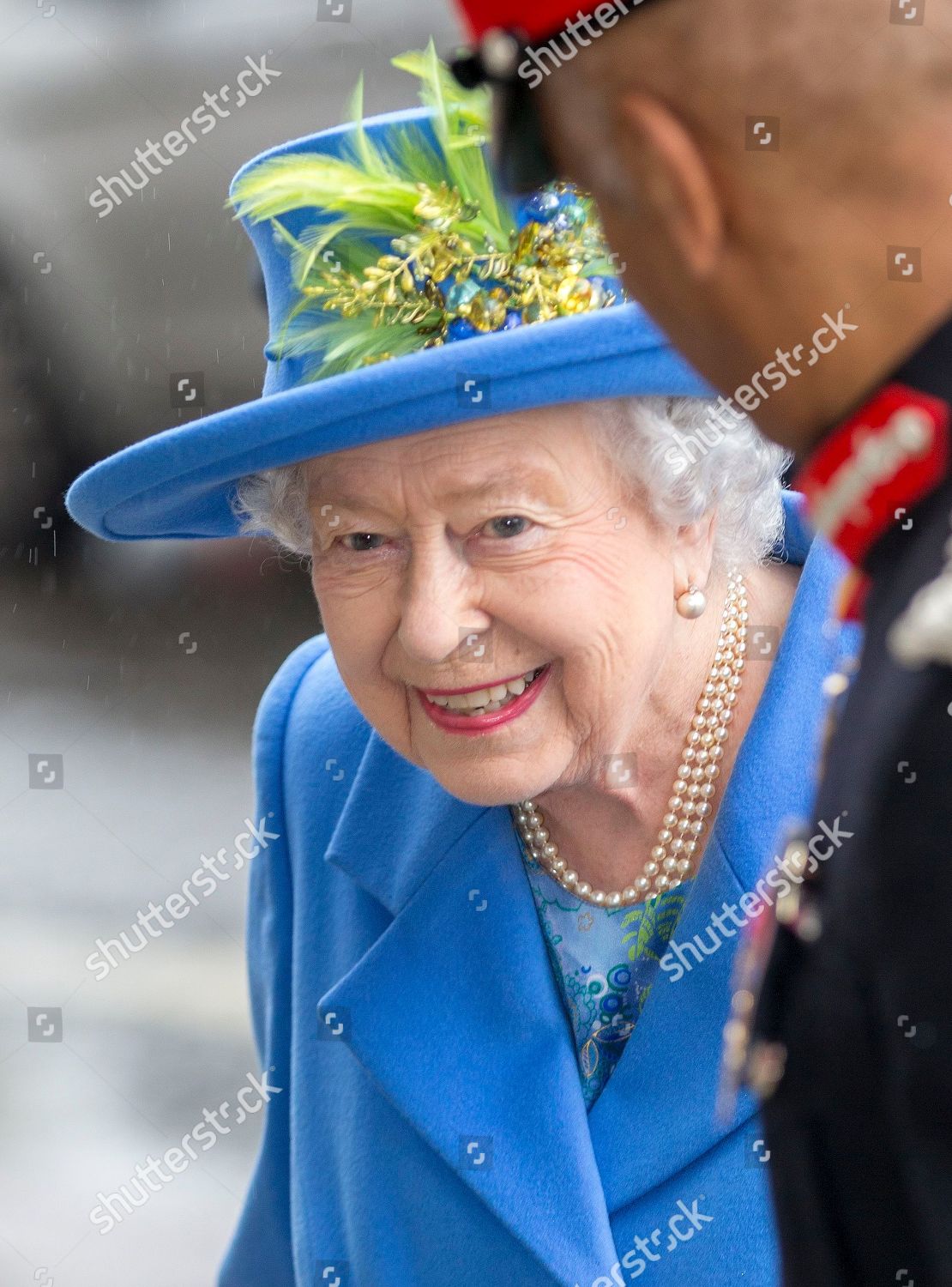 queen-elizabeth-ii-visits-the-royal-air-force-club-london-uk-shutterstock-editorial-9935966h.jpg