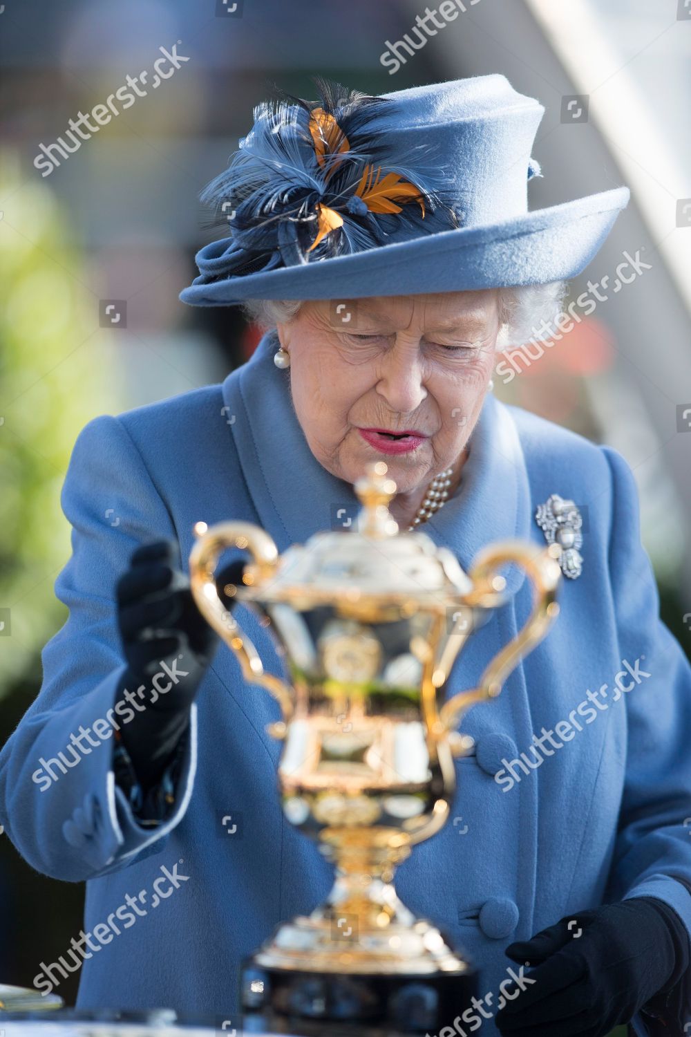 queen-elizabeth-ii-attends-the-qipco-british-champions-day-at-ascot-racecourse-berkshire-uk-shutterstock-editorial-9938969r.jpg