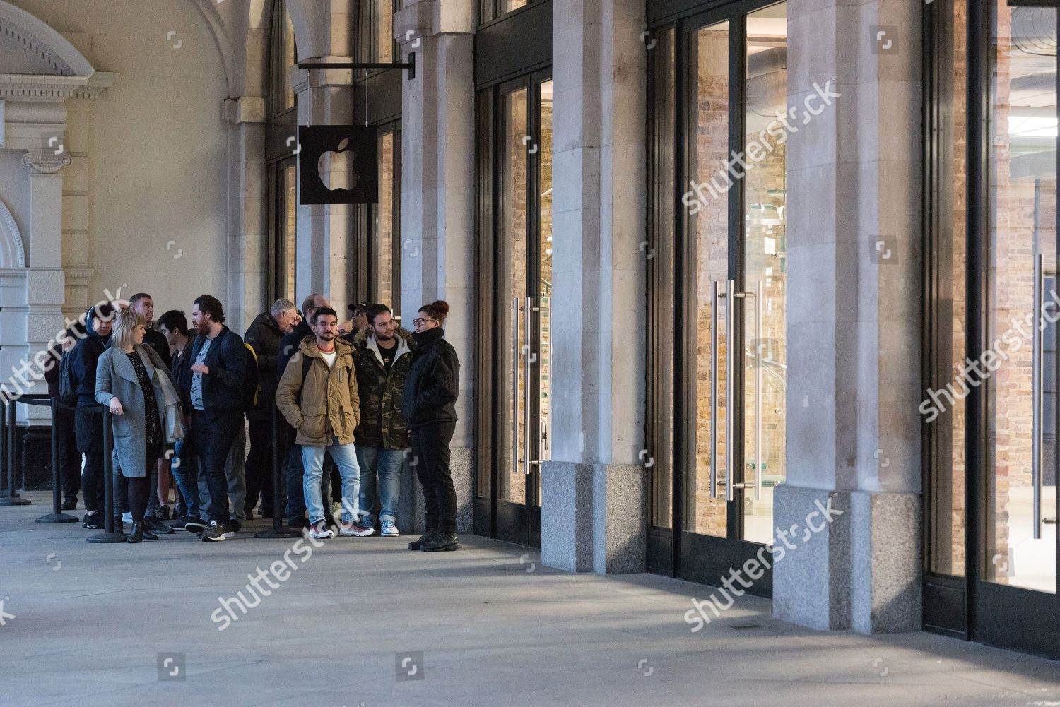 Customers Queue Outside Redeveloped Apple Covent Garden