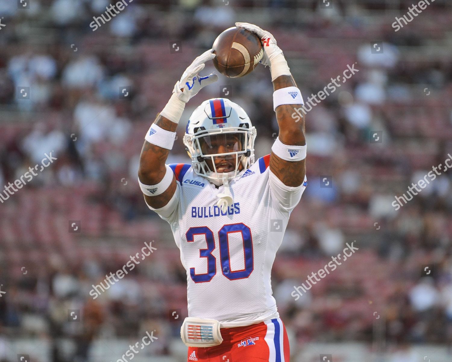 South Carolina wide receiver Bryan Edwards (89) runs with the ball against  Louisiana Tech cornerback Amik Robertson (21) and Aaron Roberson (30)  during the second half of an NCAA college football …