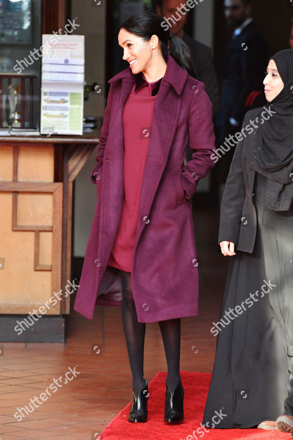 meghan-duchess-of-sussex-visit-to-the-hubb-community-kitchen-london-uk-shutterstock-editorial-9988841ag.jpg