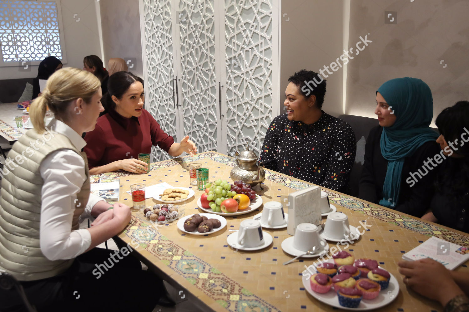 meghan-duchess-of-sussex-visit-to-the-hubb-community-kitchen-london-uk-shutterstock-editorial-9988987ao.jpg