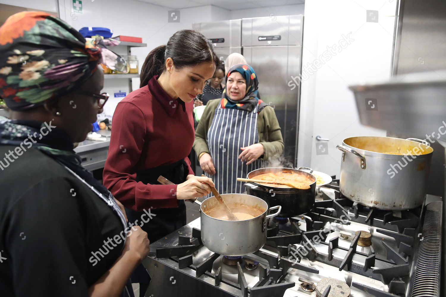 meghan-duchess-of-sussex-visit-to-the-hubb-community-kitchen-london-uk-shutterstock-editorial-9988987k.jpg