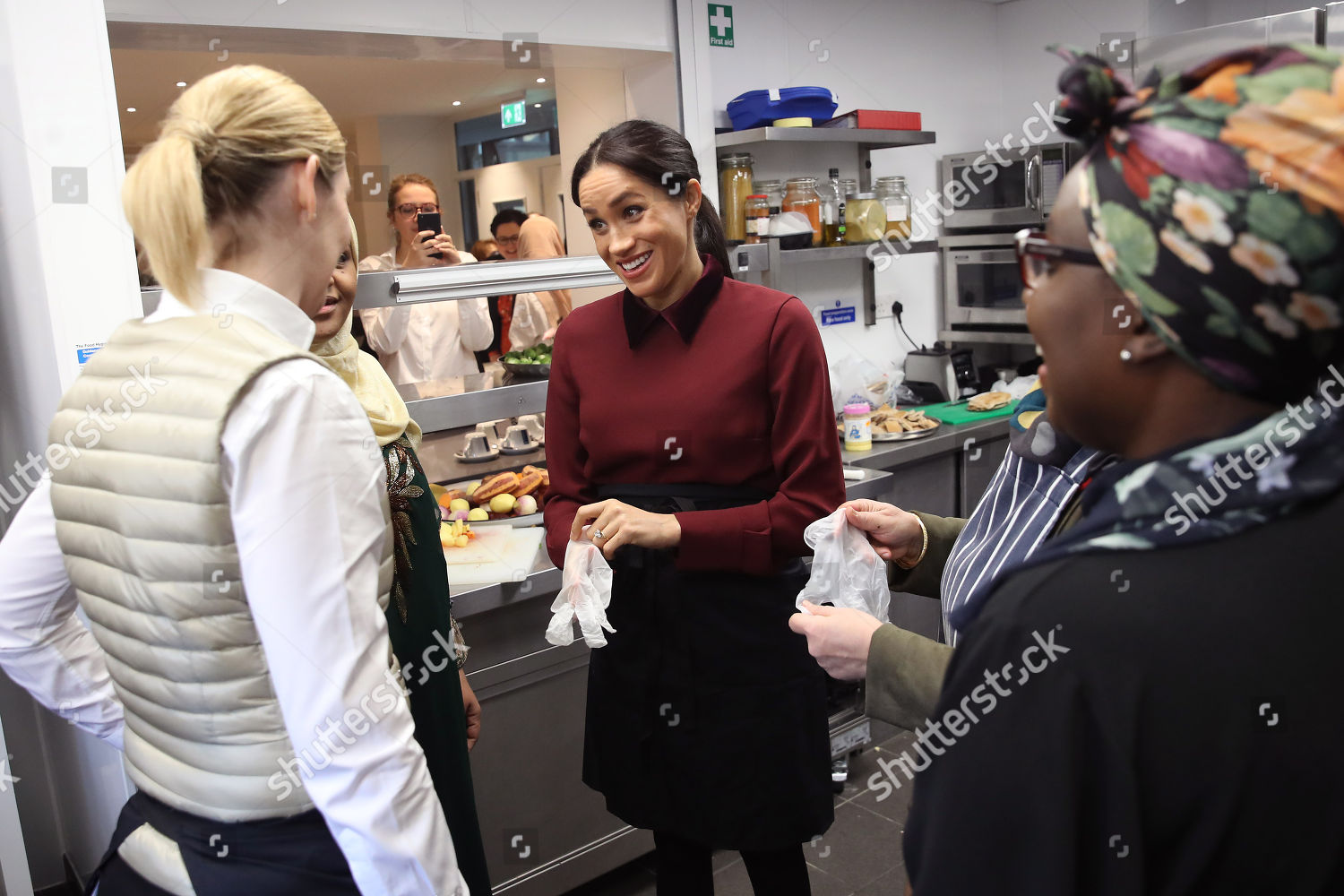 meghan-duchess-of-sussex-visit-to-the-hubb-community-kitchen-london-uk-shutterstock-editorial-9988987o.jpg