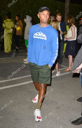 pharrell williams wearing human race shoes