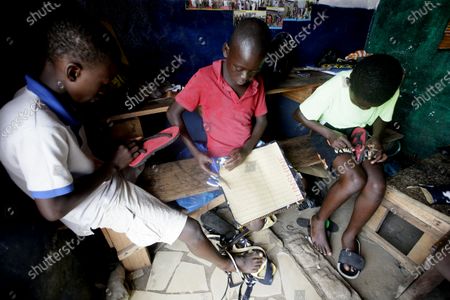 Students attend art shoe repair skills 