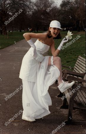 wedding dress and trainers