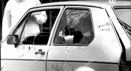 ira-shooting-at-roermont-in-holland-forensics-examine-the-vw-golf-in-which-serviceman-ian-shinner-was-killed-shutterstock-editorial-3027825a.jpg