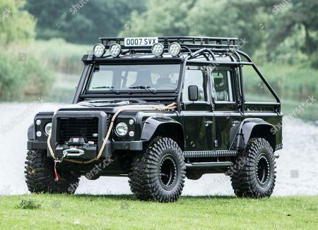 Auction customised James Bond Land Rover Defender Stock Photos ...